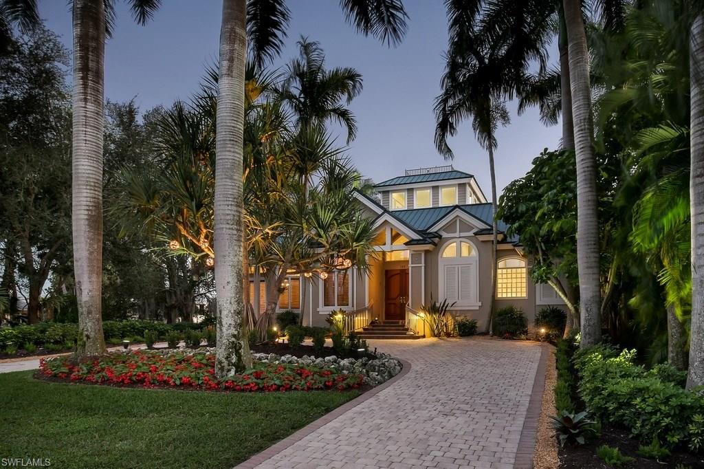 Located on beautiful and serene 7th Ave S.  A block 1/2 to the sugar sands of Naples beach and two blocks to famous 5th Ave with world class restaurants and shops.  Large oversized corner lot with alley.  You'll love this unique old Florida style 3 story home with endless charm.  A roof deck for sunset watching.  Elegant custom made mahogany doors. A large cupola with windows allowing natural lighting to encompass the first floor. Three car garage. The finest of outdoor living includes a beautiful pool/spa with solar heating backed up by a gas heater.  A greenhouse that can be transformed into another bedroom or pool cabana as the foundation is already there.  Naples was voted happiest city in the country two years in a row and this year voted best beach town! Paradise awaits!