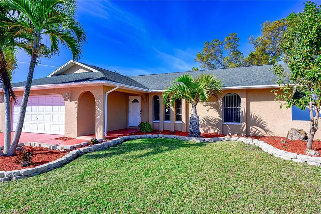 Wow !Location ,Location! Coastal Farmhouse Chic Stunning 3/2 Completely designer upgraded home accross from canal front homes up to $500K+.Volume ceilings in the open floor plan and split bedrooms. Beautiful wood cabinets in kitchens with granite countertops,Stainless steel appliances. French doors leading to recently fenced large well groomed yard,room for pool. Both bathrooms have updated vanities with granite counter tops.Wood flooring and tiles through the home.A/C and sprinkler system,hot water heater were replaced in 2017.Lancscaping was upgraded recently. Entire house was just refreshingly repainted. Ready to just move in and enjoy your refreshing icetea in you beautiful upgraded lanai,with new coastal feel fan.Start living your Florida dream home now!