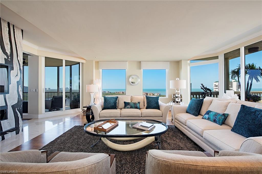 Perched majestically atop the Marquesa at Bay Colony, this beautifully remodeled masterpiece is a sight to behold! Providing over 3,700 square feet of luxurious living, this penthouse residence features three bedrooms plus a den, three full and one half baths, marble and hardwood floors, a chef’s kitchen with custom cabinetry and stainless steel Thermador appliances, newer A/C units (2013), electric sun shades, all windows and sliders replaced with hurricane impact glass (2014), all new light fixtures, two electric fireplaces, custom closets, Sonos system with built-in speakers and so much more! The interior flows effortlessly to the large outdoor terrace featuring a private rooftop spa and ample space for entertaining or soaking up the sun. Two parking spaces and additional air-conditioned storage included. This residence, together with the completely remodeled Bay Colony Beach Club, is the complete package!
