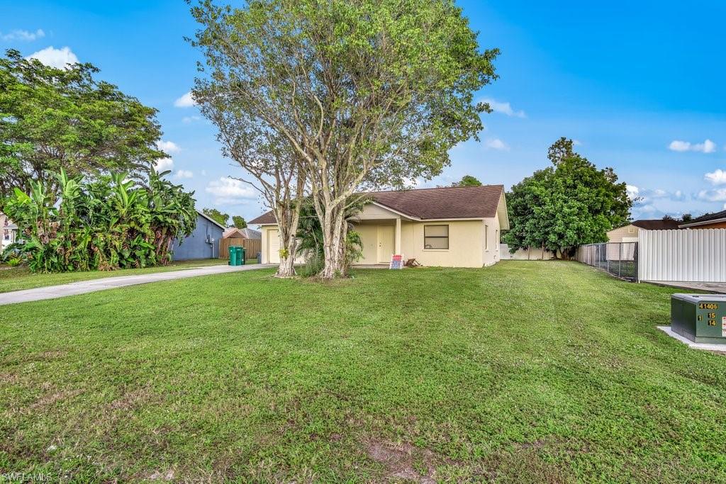 This concrete block 3 bedroom/2 bath/1 car garage single family is located in the heart of Golden Gate. Room in the backyard for a pool, tiki hut, or for parking a trailer, boat, or RV. Great for investors or first time home buyers. This home is full of potential, and very affordable at today's interest rates Don't wait, this home won't last.