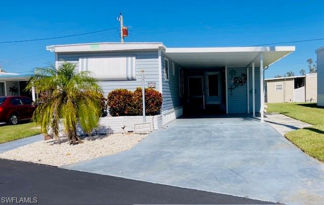 This home did not flood during 2024 storms. Home is move in ready, with great water views. This lovely well maintained 2-bedroom 2 -bath home is on a spacious landscaped interior lot with views of the river.  New kitchen with custom cherry cabinets with soft close cabinets. Granite countertops with back splash and new stainless-steel appliances in 2022.  New insulated carport and Lanai roof in 2023. Silicone coated roof in 2023 and new vapor barrier and insulation in 2022.  AC was replaced in 2020 and newer hot water heater.  This is a 55+ community with lots of great amenities including two boat ramps, clubhouse, pickle ball, bocce, shuffleboard, horseshoes, community pool, laundry, fishing pier and more. HOA fees are $407 a month. Which includes water, sewer, trash and lawn maintenance, and fiber optic Internet.  This community is located close to I-75 and centrally located to downtown Ft. Myers, shopping, stadiums and more.  Residents are allowed up to 2 Pets. Some dog breeds are not allowed, so be sure to review the rules. ESA animals are allowed.