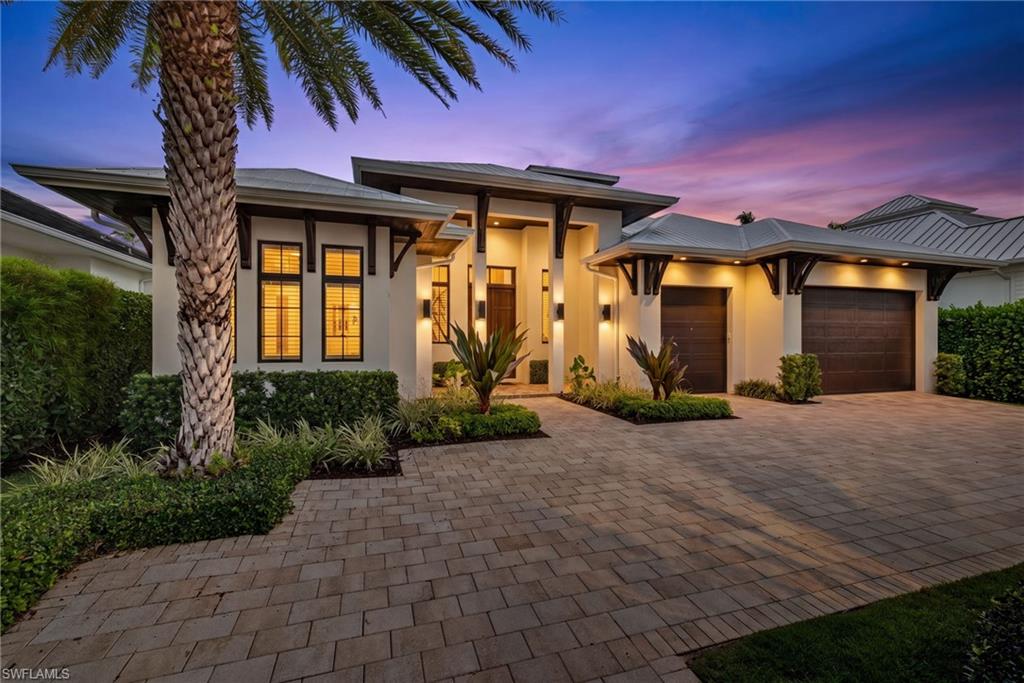 Experience the essence of waterfront luxury in this exceptional West Indies-inspired home, perfectly positioned on a deep-water Gulf-access canal. Thoughtfully designed to blend timeless architecture with effortless coastal living, the residence is centered around a stunning two-story cupola that fills the home with natural light from sunrise to sunset.

The expansive single-level floor plan offers four spacious bedrooms, creating the perfect balance of privacy and gathering spaces. At the heart of the home, a grand great room seamlessly connects to the outdoor living areas, where western exposure delivers spectacular sunsets over the resort-style pool and tranquil waterfront setting framed by lush tropical landscaping.

Crafted with uncompromising attention to detail, the home showcases an impressive collection of premium finishes and features, plantation shutters throughtout, including rich wide-plank wood flooring, custom cedar soffits and architectural brackets, integrated motorized lanai screens, a Lutron lighting system, and a chef's kitchen appointed with Sub-Zero and Wolf appliances. The saltwater pool, expansive outdoor entertaining areas, and sophisticated indoor-outdoor flow create an unparalleled living experience.

Built to the highest standards, the residence features solid concrete construction, impact-resistant doors and windows, a comprehensive security and camera system, and an oversized three-car garage. Boating enthusiasts will appreciate the 65-foot Ipe wood dock and 13,000-pound boat lift, providing immediate access to the Gulf of Mexico.

A remarkable collaboration between Falconer Jones and Seascape Builders, this waterfront retreat embodies the finest in luxury coastal design and craftsmanship.

Walk, bike ride or golf cart ride to downtown Naples renowned worldwide for its fine dining, shopping and beaches.  Convenient to Naples and Fort Myers airports.