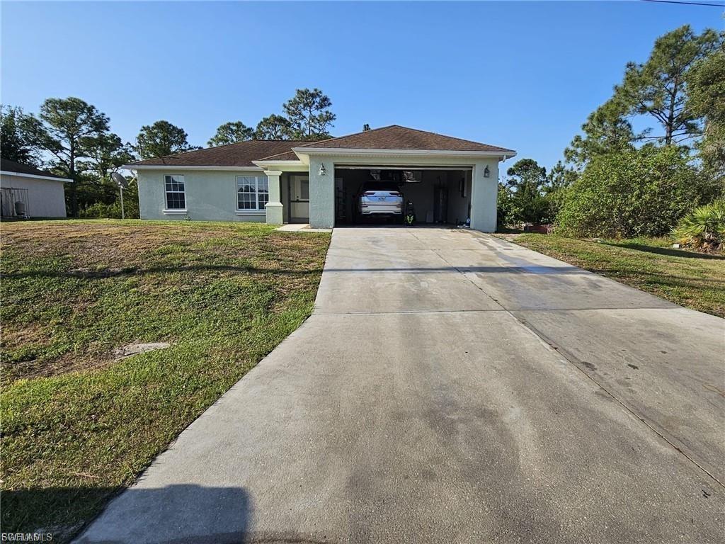 Please Do NOT Disturb tenants. Well-maintained single-family home offering 3 bedrooms plus a den (optional 4th room), 2 bathrooms, and a 2-car garage. This spacious residence features a split-bedroom floor plan, open living and dining areas, and tile/laminate flooring throughout—no carpet. The versatile den is perfect for a home office, playroom, or guest room. Enjoy outdoor living with a large and private backyard. Lawn care and water maintenance are included in the rent for added convenience. Washer and dryer included. Tile and laminate flooring throughout. Pets considered with approval. Convenient location near schools, shopping, and main roads. Available for move-in. Middle of July, $2,000/month. First, last, and security deposit required. Everyone over 18 years old needs to apply, please use link provided: https://apply.link/J_4818Y