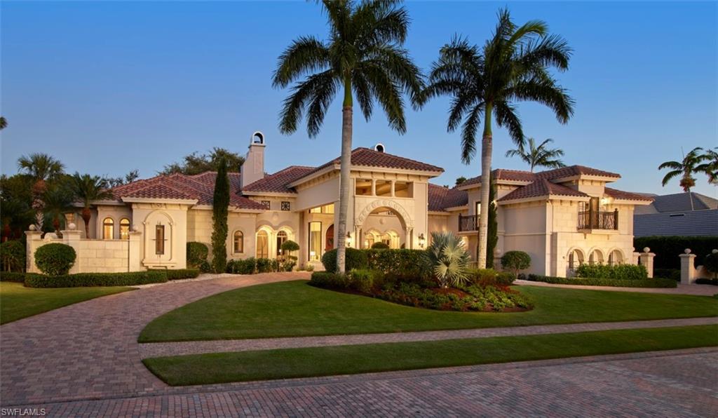 Luxurious, updated golf course estate home with a fresh new look located inside the private gated enclave of Pointe Verde, Pelican Bay. Boasting 5,061 SF under air, 4 spacious en-suite bedrooms, a private office, 3 living spaces, 3 dining spaces, summer kitchen, 60' lap pool with infinity edge, and an upstairs media room. Private entrance en-suite cabana with separate living room and kitchenette. Home site offers a serene private setting with panoramic views of the golf course and lakes. Meticulously updated and beautifully staged to enhance this estates graceful charm, and is equipped with smart home automation and whole house leak detection system. This home is sure to impress the most discerning of buyers. With only 13 lavish residences, Pointe Verde is easily one of the most exclusive gated subdivisions in Pelican Bay. Pelican Bay offers 3 miles of private sandy beach; 2 beachfront clubs with dining, cocktails and beach service; a competitive tennis program; kayaks; fitness center and the brand-new Club Pelican Bay featuring three award winning restaurants, 27 holes of golf, member fitness center and spa.