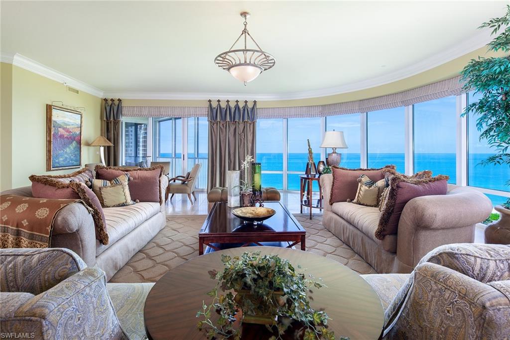 Masterfully situated directly on the beach… Savor explosive views and capture the ultimate seaside setting nestled into the heart of Gulf Shore. Estate Nine North boasts an incredibly spacious interior encompassing over 7,400 square feet and featuring dramatic walls of glass with panoramic Gulf and Bay views and expansive terraces. The architectural design complements the spectacular living areas with marble and wood floors throughout, gourmet kitchen, butlers pantry, incredible home theater, library and four full bedroom suites. In addition to the exceptional specifications, such as the 10 foot high ceilings, 8 foot high doors and secured private elevator entry, three car spaces are provided for each estate. The unsurpassed collection of amenities along with the beachside pool and spa, top notch security and utmost in privacy epitomize the finest of Naples lifestyle.