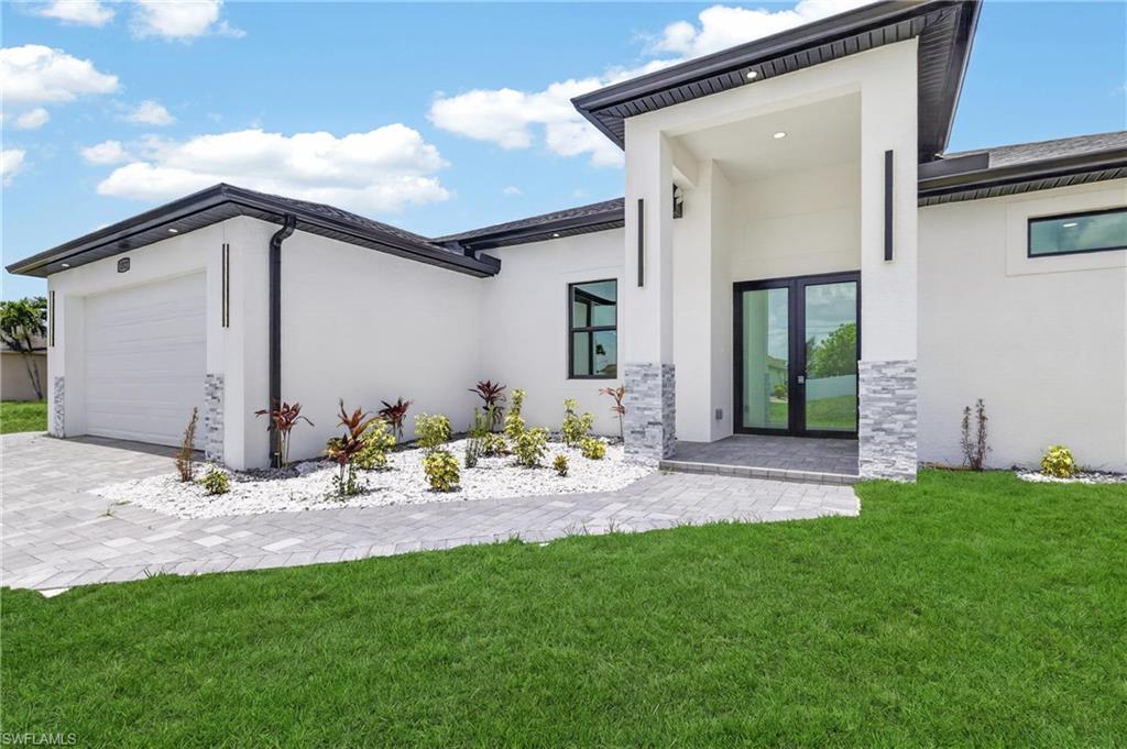Brand-new modern construction featuring 4 bedrooms, 3 full bathrooms, and a spacious open-concept floor plan designed for comfortable living and entertaining. This beautifully crafted home offers contemporary finishes, high ceilings, abundant natural light, and a seamless flow between the living, dining, and kitchen areas. The spacious primary suite provides a private retreat with a luxurious en-suite bathroom and generous closet space. Ideally located in a highly desirable area with convenient access to shopping, dining, schools, and major roadways. Situated in a No Flood Zone, offering added peace of mind and potential savings on insurance. Don’t miss the opportunity to own this exceptional modern home in a fantastic location. Schedule your private showing today!