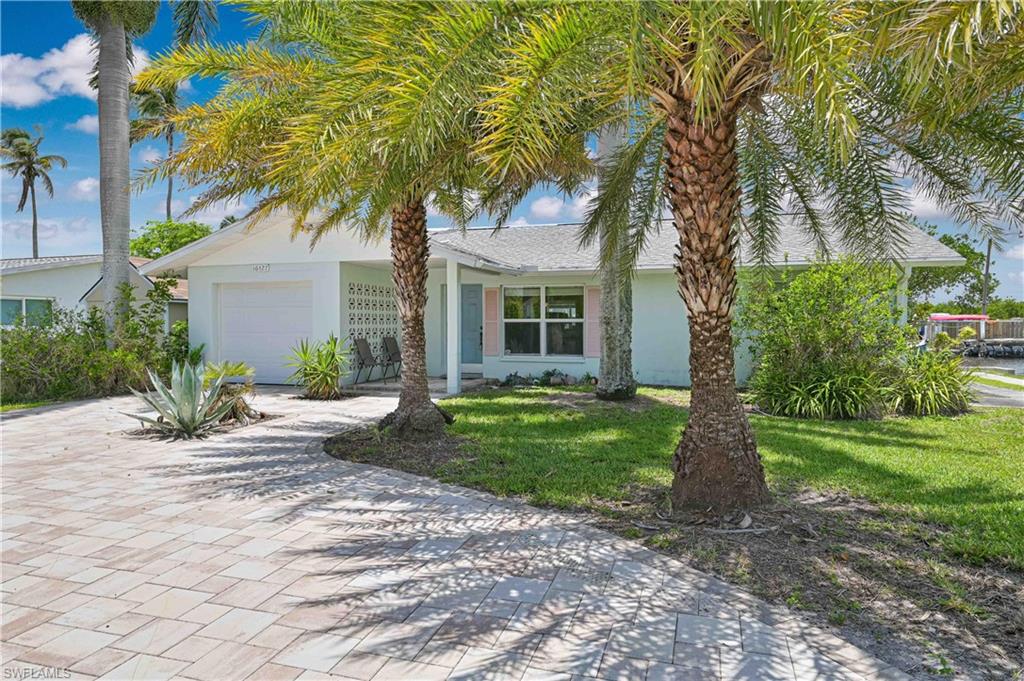 Boaters - this is the one you wait years for. A direct Gulf-access salt canal home on a wide, no-bridge canal with less than a 30-second boat ride to the open water, and a feature almost impossible to find anymore: a private, grandfathered-in boat ramp right on the property, so you launch and retrieve your own boat by trailer without ever leaving home or paying for storage.

Sitting on an oversized 9,000 sqft lot (bigger than most on the street), this solid 1970 concrete-block home has been set up for the next owner to enjoy the water immediately.

Recent improvements (2025)
• Brand-new covered boat lift (awning needs replaced), installed 2025
• Brand-new pilings and wooden dock
• All-new landscaping: 5+ palm trees and fresh sod
• New paver driveway and new paver patio in back
• Move-in-ready outdoor living right on the canal
• New exterior shed for added storage

Storm remediation - already done
This home took on water during Hurricane Milton (2024) and has since been professionally remediated and rebuilt:

• Drywall cut and removed to 3 ft, wood framing dried and treated
• All-new insulation and new drywall throughout (finished, ready for paint)
• Plumbing and electric fully on and working - no leaks, no issues
• Roof and HVAC in good working order - no leaks or issues
• New water heater

The heavy lifting is done. The home just needs the finishing touches, and the out-of-state seller is tired of renovations:

• Interior paint (drywall is finished, not yet painted)
• New appliances
• General cleanup

Knock out cosmetic repairs and you've got a turnkey Gulf-access home with a private ramp - cannot beat the value!

Why Bokeelia / North Pine Island
Quiet, no-traffic-light island living on the north end of Pine Island. World-class fishing and boating, a short run to Charlotte Harbor, Boca Grande Pass, Cayo Costa, Cabbage Key, and the outer-island beaches. No HOA.

Comparable nearby sales (same canal neighborhood, on the water, within ~2 miles)

• 16401 Porto Bello St - 2 bd / 2 ba, 1,074 sqft. Sold $527,000, Jan 2024. Two houses down - very similar comp.
• 16331 Porto Bello St - 2 bd / 1 ba, 775 sqft. Sold $440,000, Feb 2026. Smaller, one less bedroom, and substantially less land - destroyed by Hurricane Ian and sold in as-is condition MUCH worse than this home
• 16341 Porto Bello St - 2 bd / 1 ba, 768 sqft. Listed at $499,000, a few houses down. Smaller house and smaller lot.

Note: Sold as-is. Buyer to verify all measurements, flood zone, and insurance.