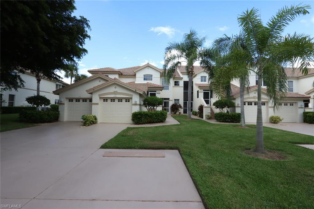 TOP FLOOR GOLF VILLAGE CARRIAGE HOME WITH VAULTED CEILINGS.  THIS "NEWPORT" FLOOR PLAN IS AN END UNIT WITH LOTS OF WINDOWS AND NATURAL LIGHT. OVERLOOKS THE 12TH & 11TH FAIRWAYS AND A LAKE. VIEW OF THE 11TH GREEN. LOADED WITH UPGRADES. TILE EVERYWHERE BUT THE BEDROOMS. STAINLESS STEEL APPLIANCES. GRANITE COUNTERS.CROWN MOLDING. A/C 2019. NEWER WATER HEATER. WHITE CABINETS.TILED LANAI. ACRYLIC SLIDERS AND NO SEE-UM SCREENING ON THE LANAI. UPDATED BATHROOMS AND SO MUCH MORE!