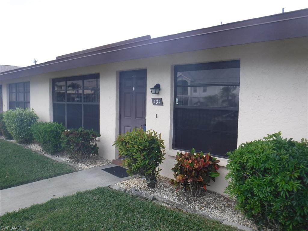 Welcome Home!! Take a look at this little gem in Cape Coral. As you walk in you will notice how quaint and cozy this 2 bedroom, 2 bath condo is. Consisting of an bright open living and dining room. This condo features hurricane shutters, newer AC, new Roof (2019), lots of storage space and nicely sized bedrooms. There is an additional 164 sq.ft. of a window enclosed Lanai off the main bedroom sliders, making an additional sitting area for morning coffee or tea with a landscaped view that is also accessible from the second bedroom. The main bedroom has its own ensuite with shower while the second bedroom includes two large walk-in closets for clothes and or storage. Laundry is in the spacious closet on the Lanai. The small kitchen has a tall built-in pantry plus all major appliances. Behind the unit is the landscaped walkway leading to the clubhouse and pool. Your assigned parking and mailbox is just a few steps from the front door. This home is a short drive to Cape Coral Parkway for shopping and restaurants. Minutes away from the Yacht Club Community Park, Veterans Park, Jaycee Park and Four Freedoms Park as well. Or stay close to home and socialize at the clubhouse and pool.