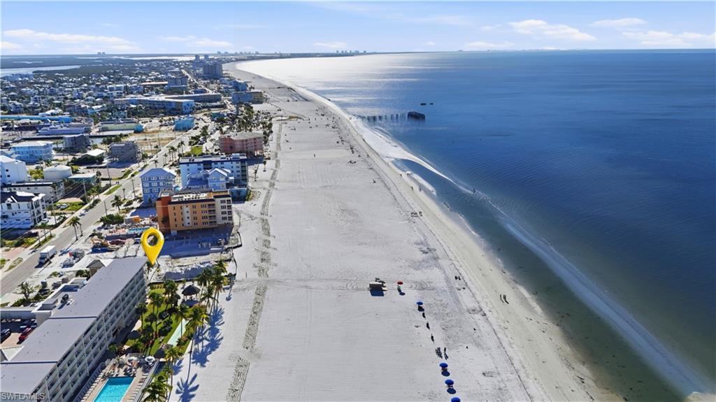 One or more photo(s) has been virtually staged, AI generated or rendered.  RARE OPPORTUNITY—BUILD YOUR OLDE FLORIDA BEACH COTTAGE WITH STUNNING GULF VIEWS! Beach & SUNSET Lovers DREAM HOME LCOATION. Build your 2 Story Gulf Front Cottage on this Prime location. Stroll along the Beach to Margaritaville, a few steps more to Nellies, SOB, Yucatan and more. Wake up to the soothing sound of waves and end your day with stunning Gulf-front sunsets—all from a second-row lot that offers views typically reserved for Gulf-front properties! This prime North Tip parcel sits just one lot back from the Gulf, but here’s what makes it truly exceptional: the Gulf-front lot in front of you has a permit in place for a one-story home. That means if you build a two-story beach house, you’ll enjoy unobstructed, panoramic Gulf views from your second floor! It’s an incredible advantage—capturing the beauty of beachfront living without the Gulf-front price tag. With the sand at your doorstep and the Gulf as your backdrop, this is your chance to create a one-of-a-kind retreat in one of the most coveted locations on Fort Myers Beach. Survey and MUD letter are ready to go, making your path to paradise even easier! And the location? Unbeatable. Just a five-minute stroll along the sparkling white sand leads you to Times Square, the town fishing pier, vibrant restaurants, live entertainment, and Margaritaville. Whether you crave the energy of island life or the peace of a secluded beachfront escape, this lot delivers the best of both worlds. A rare find. A prime location. A view that will never be blocked. This is one of the best values on Fort Myers Beach—don’t let it slip away! Rendering is for concept purposes only, and the home is not included in the price.
