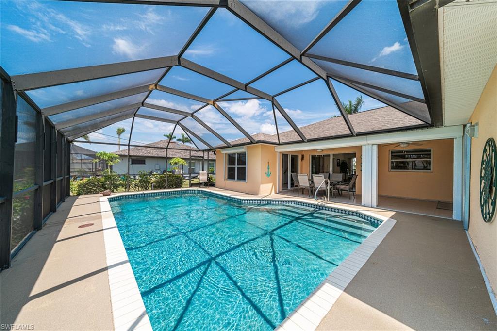This  lovely pool home right in the heart of SW Cape Coral! With almost 2,000 square feet, 3 bedrooms, den, and 2 bathrooms is this home is ideal for residential or vacation rental. The house comes completly furnished so you can move in right away or rent it out for vacation rental. The house has a splitted floorplan.  The Patio can be closed with electrical shutters. The screened Sundeck with Pool and South exposure  invites to enjoy the sun all day long.  The  SW Cape Coral location offers fantastic amenities, boating, shopping, health care, top rated schools, charming Matlacha, and Downtown Cape Coral all just minutes away! NO FLOODING! Just got a NEW ROOF and NEW GUTTERS! Dont miss out this opportunity and schedule your showing right away!