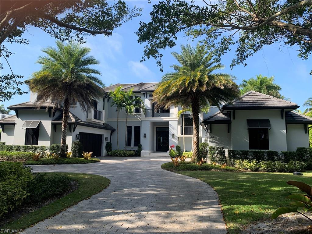 Exquisite custom home with Southwestern views down Runaway Bay. This classical, lightly lived-in estate was drawn by Don Stevenson Design, constructed by Werchek Development, with interior design and furnishings by Julie Coleman, of District Design. With 6 bedrooms, 6 full and 2 half baths, this home will easily accommodate large gatherings. Gourmet kitchen with commercial grade appliances, pantry, bar, library with paneled walls, book cases, large master suite with sitting room, luxurious master bath, custom closets, covered lanai with bar and outdoor kitchen, electric screens and shutters on lanai, elevator, full home automation with generator, 60' floating dock with lift and 3 car garages are just a few of the homes many features. Resort style infinity pool and spa with extensive outdoor patios and landscaping finish off the tropical exterior. The finishes and attention to detail is evident in every room and will satisfy the most discerning buyer. Port Royal Club membership eligibility.