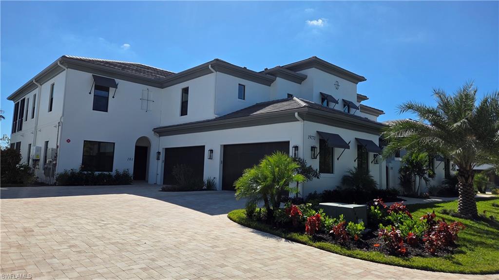 Introducing Nerano, a new coach home neighborhood by Front Door Communities located within the award-winning Miromar Lakes Beach & Golf Club. This limited collection features 10 buildings with four residences each. Will have 2 homes available for occupancy by May 2026, 3 more in August 2026 and 4 additional homes by December 2026. Act now and make your personal selections, choose your colors and finishes and make Nerano your new home or winter getaway! These designer-coach homes offers a private entrance, open-concept great room, volume ceilings, and a gourmet kitchen with large island. The floor plan includes 3 bedrooms and 3.5 bathrooms, a screened lanai with serene lake and preserve views, and an attached 2-car side-entry garage. Buyers may select from ground-floor or top-floor configurations Top floor offers a private den and private elevator as well as choose from a wide variety of available customization options. Residents of Miromar Lakes enjoy access to a 700-acre freshwater lake, 3 miles of white-sand beach, a 10,000 sq. ft. zero-edge infinity pool, three onsite restaurants, European spa and salon, fitness center, tennis, pickleball, bocce, racquetball, and the Arthur Hills Signature Championship Golf Course. Concierge services and an extensive lifestyle program complete this exceptional community.