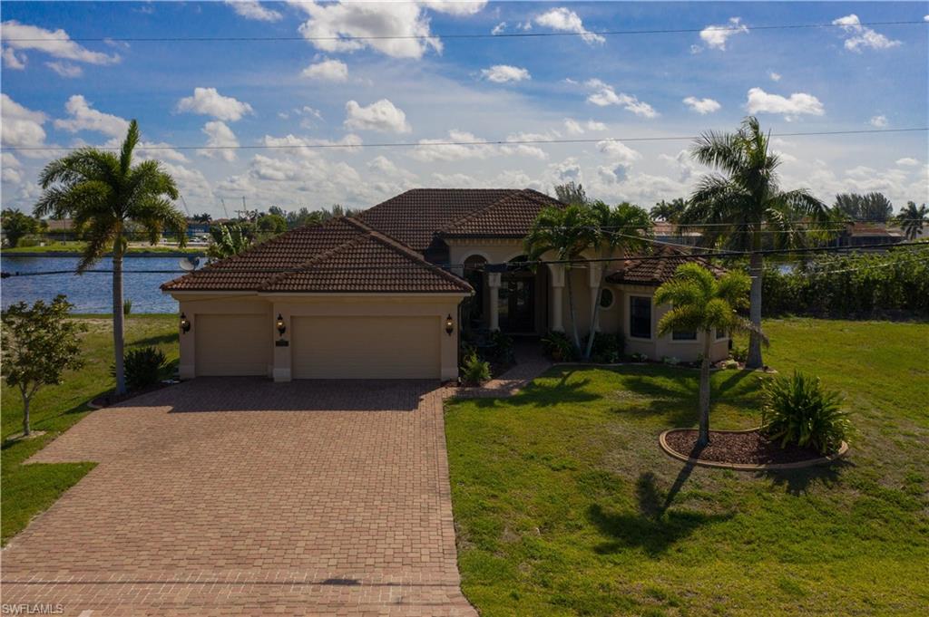This is a custom Villa built home with many additional features added. It is located on Ceitus Lake and has a 400 foot view across the lake at other luxury homes. This home is on city water and sewer and the assessments have been paid in full. It has pavers in the driveway and around the pool and spa area. The zero edge salt water pool adds to the enjoyment of the lake view. This home was built for the enjoyment of the discerning owner, looking to pamper themselves and enjoy the good life in paradise.