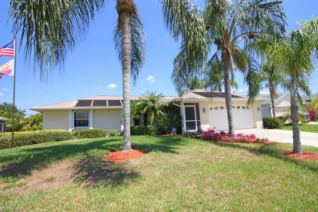 Beautiful and cozy 3B/2B single family pool home in Bonita Springs available for sale! With over 1,300 sq.ft. and several custom upgrades, this home has plenty to offer! With tiled and carpeted flooring throughout the home, enjoy the dining room, spacious living room, and custom extended breakfast bar. This home also features upgraded cabinets in the kitchen. Updated French doors replace traditional sliders and provide access to the lanai from both the Master Bedroom and the living room. The spacious Master Bedroom features his and hers separate walk-in closets w/ extra shelving and drawers, and a remodeled bathroom w/walk-in frameless glass shower. Additional features include an ADT security system, custom blinds in the living room, extra shelving in the garage, brand new pool pump, and new shutters. The guest bathroom has also been remodeled. Relax on the private, lanai that features a separate screen from the lanai to the pool. Perfect for additional shelter from those occasional rainy days. Also enjoy solar panels on the roof to conserve energy! Just a short drive to some of Florida's best beaches, plenty of shopping, dining and recreation. Call to schedule your showing today!