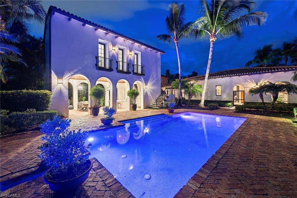 Inspired by the designs of Addison Mizner, this home embodies the essence of understated elegance. Unassuming at first glance, this remarkable home unveils its true beauty upon entering. The architectural design of this five-bedroom home is reminiscent of a space built and evolved over time, with a deliberate focus on the gathering areas, while keeping the bedrooms private and secluded. As you move through the home, glimpses of enchanting courtyards peek through the windows, including a private putting green, adding to the allure and uniqueness of this property. The kitchen seamlessly flows into the great room, dining areas and covered outdoor living space, offering unobstructed views of the water and golf course. Additionally, the guest cabana and secondary covered outdoor entertaining space, complete with an outdoor kitchen, fireplace and full bath, overlook the inviting pool retreat and offer exceptional privacy. In Mediterra’s Cortile neighborhood, this one-of-a-kind home is brimming with charm that words simply cannot capture. It must be experienced firsthand. In the award-winning community of Mediterra where you can have it all!