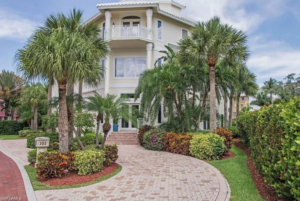 Fantastic Barefoot Beach Gulf home opportunity! This residence is situated on two lots, only pays one lot assesement and captures stunning Gulf views from nearly every room! This home boasts six bedrooms, plus a den and six baths.  Plans are completed and in for permit for renovation. This home can have a large in ground pool, chickee hut and outdoor entertaining area overlooking the gulf.  Call for details and to view renovation plans.