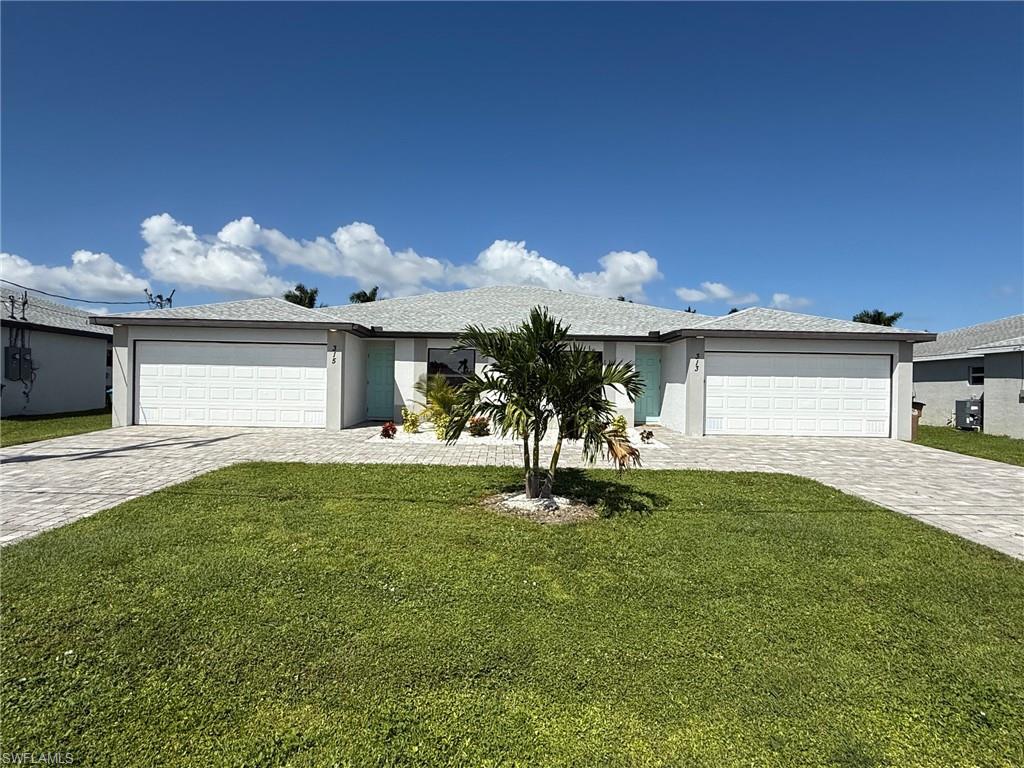 This 2022 built duplex comes fully furnished. The property features 3 bedrooms, 2 bathrooms an electrically heated swimming pool that is not shared with the adjoining duplex. Tile throughout, stainless steel appliances, granite counter tops and neutral wall paint throughout the property. The washer and dryer are located inside the property and the 2 car garage offers plenty of space for storage and to park a vehicle. The driveway features interlocking pavers and it is circular, which offers plenty of parking when having company. The lanai also features interlocking pavers and a great view of the electrically heated swimming pool and gulf access canal. 
*The boat lift is currently available and can be rented for an additional fee*.