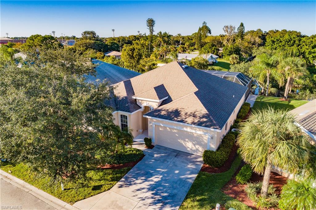 Palm Island is a Gated River-Access Community, with Boat Launch, Docks & Boat Storage. Welcome to this beautiful and impeccably maintained 3 bedroom, 2 bath home. House has tile and carpet, plenty of counter and cabinet space. The floor plan is spacious and the lanai is large and comfortable. Spend your evenings overlooking the intersecting canal from your private dock, or lounge in the infinity edge pool or spa on your screened lanai. Boaters, there is a short ride to the river for quick access to beaches and fishing. Amenities include a community pool, gym, game room, tennis courts, and much more. Group activities and events make this feel like a true community and not just a neighborhood. Low HOA and zero maintenance make this a desirable place to be. Schedule your private showing today!! Agents, please see remarks.