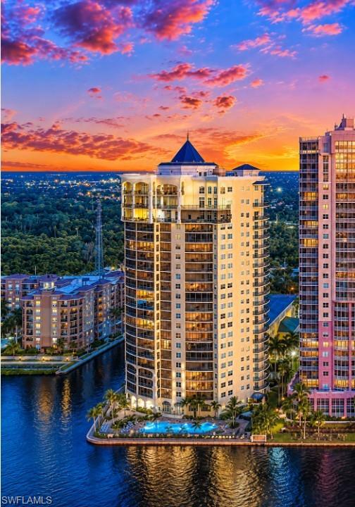 Experience luxury waterfront living at its finest in this spectacular penthouse condominium offering breathtaking sunset views and priceless panoramic vistas of the Caloosahatchee River. Perfectly positioned with a easy shoot to Fort Myers Beach, Margaritaville, Pink Shell and Sun Seekers Resort  this exceptional residence combines privacy, convenience, and an unparalleled Florida lifestyle.

Step inside and discover a spacious, impeccably maintained home designed to capture stunning water views from nearly every angle. The expansive lanai is a true showstopper—an inviting retreat where you'll enjoy morning coffee, evening cocktails, and unforgettable sunsets that paint the sky each night. Entertain with ease in the gourmet kitchen featuring natural gas cooking while taking in the beautiful riverfront scenery.

Guests will appreciate their own private suite, providing comfort and privacy during every visit. Additional features include private penthouse-level storage, three (3) dedicated parking spaces, an in-residence washer and dryer, and the peace of mind that comes with a meticulously maintained, move-in-ready home.

This prestigious waterfront community continues to invest in excellence, featuring a beautifully renovated lobby, fresh exterior painting, a new cooling tower, and a new roof. Boating enthusiasts will appreciate short-term boat anchoring opportunities, while residents enjoy maintenance-free living with exceptional building integrity and security.

The resort-style amenities are second to none, including a fitness center, sauna, billiards room, media room, library, elegant piano sitting room, and numerous social and recreational spaces designed for an active and sophisticated lifestyle.

Located just a six-minute walk from vibrant downtown shopping, dining, entertainment, and cultural attractions—with convenient seasonal trolley service available—this remarkable penthouse offers the perfect blend of waterfront serenity and urban convenience.

Rarely does an opportunity arise to own a residence that delivers such extraordinary views, unmatched privacy, premium amenities, and a truly carefree Florida lifestyle.