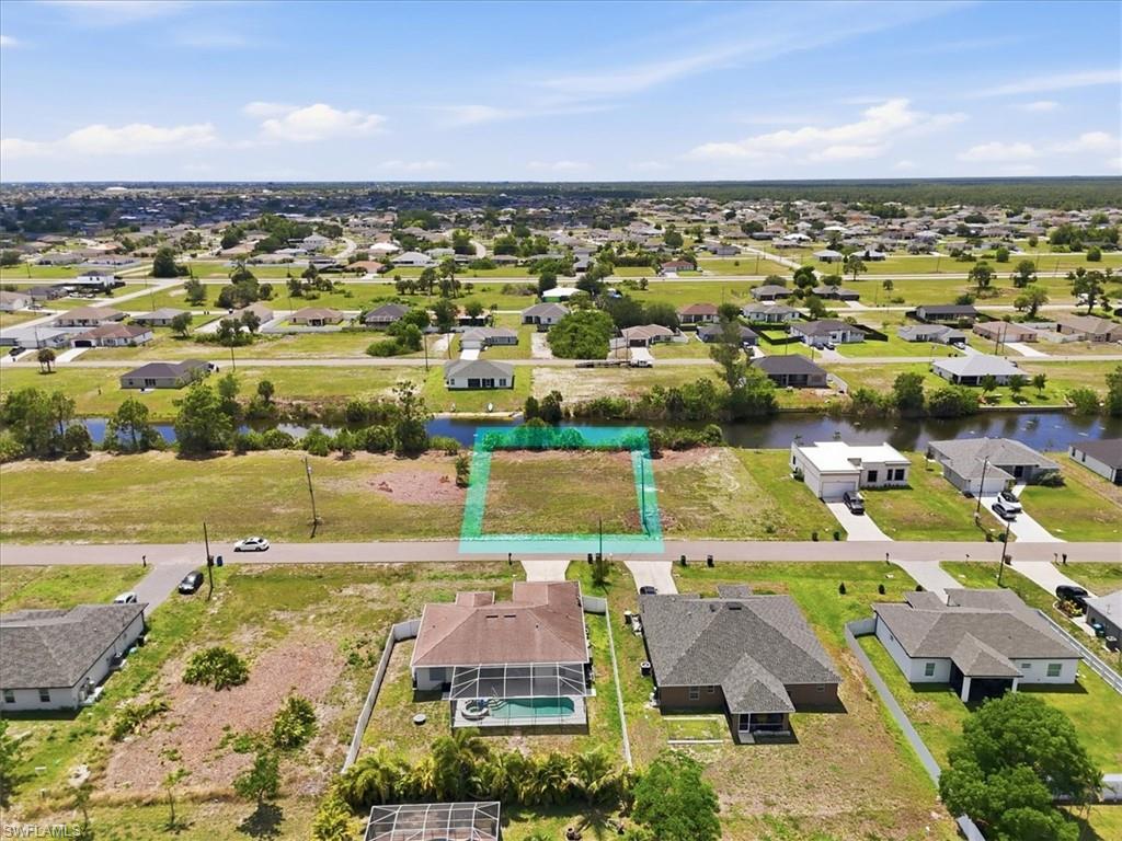 Vacant land opportunity in Cape Coral, Florida! 3000 NE 1st Pl, Cape Coral, FL 33909 is located in the desirable Northeast Cape Coral / Mariner area and offers approximately 0.23 acres with reported canal access and canal views. This Southwest Florida homesite is ideal for buyers exploring new construction, investment land, or a future custom home in one of Lee County’s fastest-growing markets. Conveniently located near Pine Island Road, Del Prado Blvd, shopping, dining, schools, parks and everyday amenities, this Cape Coral lot provides a strong location for those looking to invest in Florida real estate.