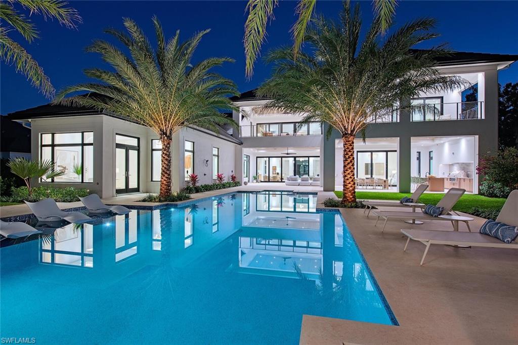 Just completed! Ideally located at the west end of Coach House Estates is this custom designed home sitting on over 2.3 acres. Drawn by JMDG Architecture, conscientiously built by the Glendale Group of SWFL, and finely appointed by Alex Zapirain Designs. With over 8,700 AC sq.ft in the main home and nearly 1,000 AC sq.ft in the full guest house, this property offers an incredible estate experience. In the main home; 5 en-suite bedrooms, club room (optional 6th bedroom), 6 full and 2 half baths, climate controlled 5-car garage (with room for lifts), true gourmet kitchen, full prep-kitchen, wine room, butler’s pantry/wet bar, and stunning outdoor covered and uncovered living areas. The ideal mix of a transitional, open plan with a more traditional provision of separate spaces for privacy.