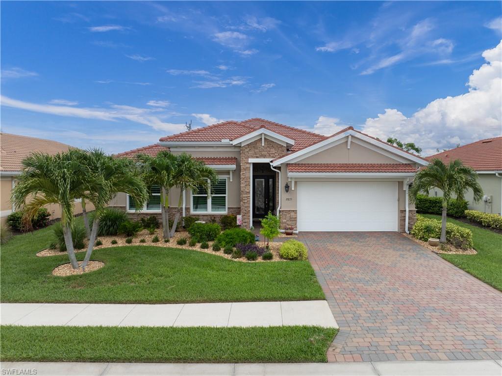 This beautifully maintained home offers the ideal blend of luxury, comfort, and resort-style living. From the moment you arrive, you'll appreciate the home's curb appeal, mature landscaping, and inviting entrance. Inside, you will find the open floor plan creates a seamless flow between the living, dining, and entertaining spaces. Large windows with plantation shutters fill the home with natural light. The spacious kitchen is designed to be the heart of the home, featuring a walk-in Pantry, Jenn-Air Appliances, including an induction range. The adjoining dining and living areas provide plenty of room for gatherings while maintaining a warm and welcoming atmosphere. Sliding blinds in the family and dining room offer the option of privacy. The garage comes equipped with a level 2 electric car charger and the electrical panel is wired for a generator.  New tile roof(2025), air conditioner and exterior paint(2026).  Roll down shutters installed for the lanai and entrance. Step outside and discover what truly makes this property special. The outdoor living area is designed for year-round enjoyment, whether you're sipping morning coffee while watching the sunrise over your saltwater pool, hosting weekend barbecues (lanai plumbed for outdoor kitchen), or unwinding in the evening. Additional features throughout the home provide convenience, functionality, and peace of mind, making this property move-in ready and ideal for anyone seeking the Florida lifestyle they've always dreamed of. Located within the boutique, gated, walk able Sunset Pointe community, residents enjoy easy access to shopping, dining, and entertainment.  Whether you're looking for a primary residence, a winter retreat, or an investment in one of Southwest Florida's most desirable areas, this home offers a rare opportunity. Imagine ending every day with spectacular sunset views reflecting across the lake, surrounded by comfort, beauty, and the relaxed lifestyle that makes Florida living so special. This house is more than just a home, it's a place to create lasting memories.
Schedule your private showing today and experience firsthand everything this remarkable property has to offer.