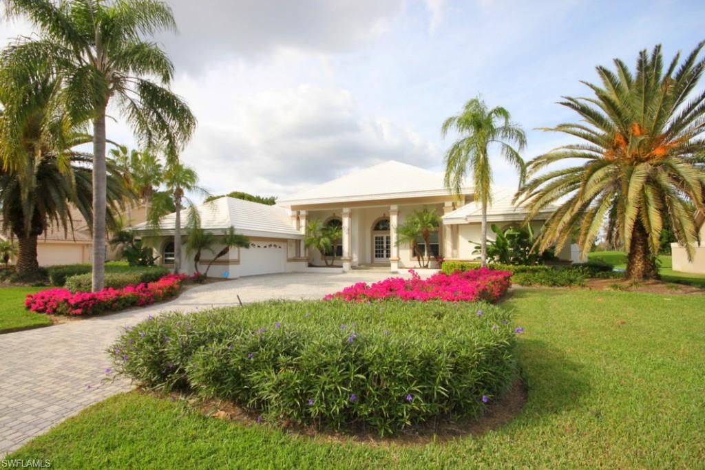 Best of both worlds - Lake AND Golf course views off your lanai! This 4 bedroom, 3 bath home boosts 3,800 spacious sq ft under air! 4th bedroom can also be utilized as a great office or den. Mitered glass windows in Kitchen, Family Room, and Master Bedroom showcase the beautiful views. Large formal living room, kitchen, dining room, and family room flow seamlessly together allowing for great entertaining space! Wet bar and wine cooler in family room. Kitchen has a pass-thru window to the lanai for easy access to the outdoor area. Pool completely refinished, reverse osmosis system installed, A/C units both replaced, and hot water heater new all in 2012. Garage offers space for 2 cars, storage, and a separate golf cart garage door. Walking distance to the Clubhouse at Wildcat Run. Home backs to the first fairway of this Championship Arnold Palmer Signature designed 18-hole golf course! Schedule your showing appointment today! This home will not last long!