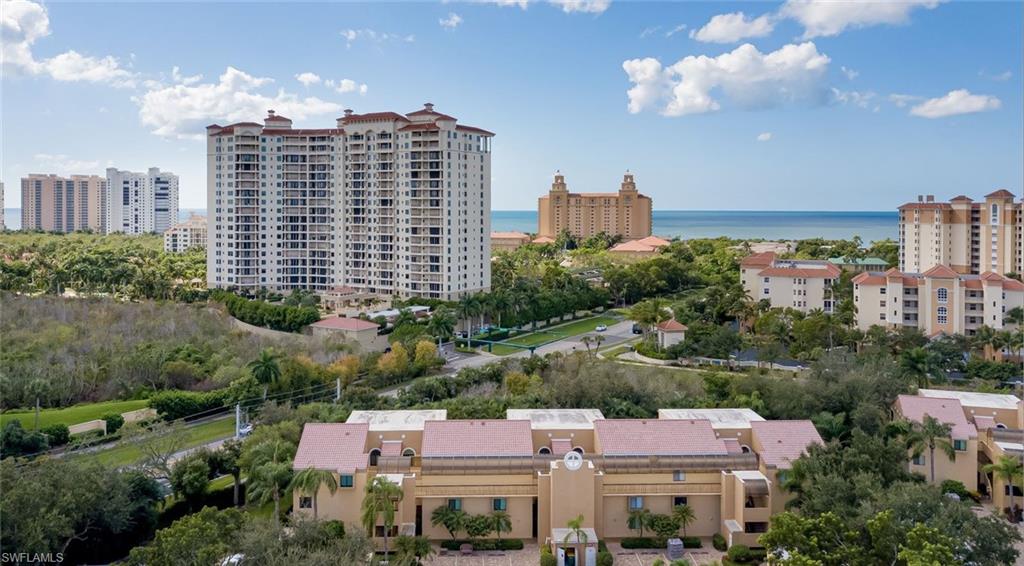 *** WELCOME  HOME *** LOCATION - LOCATION - LOCATION! ***  WALK OR BIKE TO VANDERBILT BEACH! 
THREE bedroom condo, Spacious END unit, FURNISHED, the CLOSEST building in Beachwalk to Vanderbilt Beach, and adjacent to the walking gate. ONE OWNER! FORMER MODEL!  1450 square feet under air! Well maintained. Beachwalk is a LOW density, WALLED, MAN gated community 24/7, 365 days a year. There are two (2) HEATED swimming pools; six (6) HAR TRU lite tennis courts; bocce court; club house with scheduled activities. Comcast HIGH Definition TV and Internet are now INCLUDED in the HOA quarterly dues. Beachwalk is within walking or biking distance to several popular local restaurants, theaters, Publix, Mercato, urgent care center, public library, and several other activities. RENTALS:  you can rent your condo twelve (12) times a year (30 day minimum) and the seasonal rental demand for Beachwalk is HUGE. Easy to show, call for a showing today.