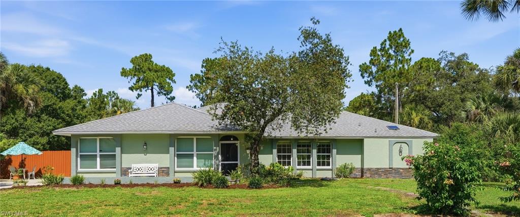 Welcome home to your own private Florida retreat! Perfectly situated on a spacious half-acre lot with no HOA, this beautifully renovated home offers the ideal combination of luxury, comfort, and outdoor living. Whether you're entertaining guests or enjoying a quiet evening by the pool, this property is designed to make every day feel like a vacation.
Step inside to an open and inviting floor plan featuring a spacious great room, separate family room, and formal dining area that provide plenty of space for both everyday living and entertaining. The heart of the home is a chef-inspired kitchen complete with granite countertops, custom real wood cabinetry, professional-grade appliances, double ovens, an on-demand hot water faucet, and a large breakfast bar perfect for gathering with family and friends.
The luxurious primary suite is a peaceful retreat with pocketing glass sliders that open directly to the screened lanai and sparkling saltwater pool. A custom walk-in closet with built-in organization and a spa-inspired ensuite bath featuring a soaking tub and oversized walk-in shower with dual full-body shower panels create the perfect place to unwind.
Outdoor living truly sets this home apart. Enjoy your private screened lanai with a sparkling saltwater pool, expansive covered seating area, sun deck, outdoor shower, and convenient pool bath—ideal for year-round Florida living. The oversized backyard offers plenty of room to relax, play, garden, or store your outdoor toys, while a storage shed provides additional functionality.
This move-in-ready home has been thoughtfully updated with a new roof, new A/C, reverse osmosis water filtration system, one-person sauna, new skylight, luxury flooring throughout (no carpet), beautifully renovated bathrooms with custom vanities and upgraded shower systems, custom woodwork, built-in laundry storage, upgraded sinks, and an extended driveway.
With exceptional craftsmanship, extensive upgrades, and resort-style amenities, this home delivers a rare opportunity to enjoy luxury living with the privacy and freedom of a half-acre property—all in a convenient Lehigh Acres location.