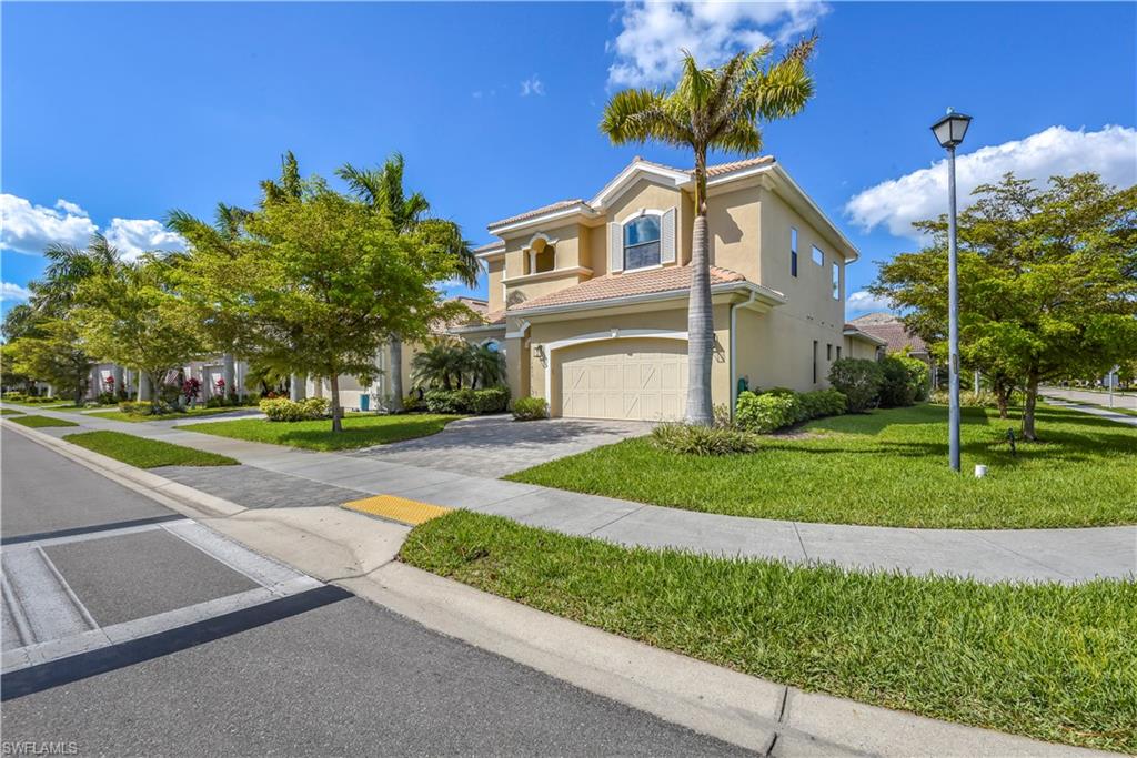 Hidden gem in distinct Naples gated community! Situated on a premium lot - oversized & corner - this 2 story Alora II model home has a sprawling layout w/ master suite on first floor along w/ den w/ French door entry and 2 guest suites, 1 guest room, and huge bonus room on the second floor. Meticulously cared for and featuring plantation shutters, high-end light fixtures & fans, gorgeous flooring on first floor, new carpeting on the second floor, volume & tray ceilings, approximately 300 sq ft of additional under-air storage space, and an open concept kitchen w/ upgraded Kitchencraft cabinets, quartz countertops, & stainless steel appliances. You will LOVE the outdoor living space- massive screened lanai w/ long under truss area... ideal for entertaining! Andalucia offers a secure gated entry w/ keypad, community pool & spa, community room w/ kitchen, playroom, playground, basketball court, and fitness center. Very convenient location- easy access to I-75, only 6 miles from the shopping & dining of MERCATO and less than 8 miles from the beautiful beaches of the Gulf of Mexico.