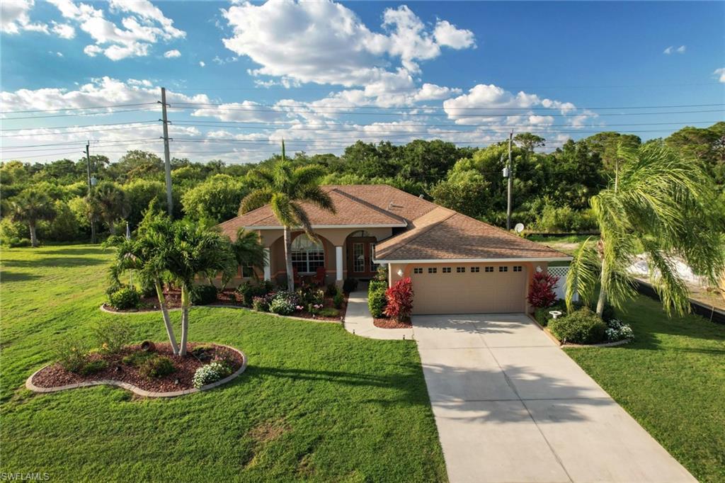 This home with AN EXTRA LOT TO THE LEFT OF THE HOME is  located in an unique deed restricted community is known as Shamrock Shores. This superior home is a 3 bed /2 1/2 baths, heated pool, nice extended pool deck for lounging and Tiki Bar time. The home has a central vac and irrigation system. The owner installed a 4-ton A/C in 10/2021  More? Did you say more information? The home is immaculately kept ready to move in to and comes with some furniture!  The area is built around a 7-acre spring fed lake, known as Lake Weaver and there is a right of way to go to it at lot 72. From Shamrock Shores it is a short ride to Englewood Beach, Stump Pass Beach, Blind Pass Beach, Manasota Beach and Boca Grande Beach! Besides going to the beach there are at least 8 golf courses within 5 minutes of the home, fishing, boating, shopping, art galleries, two MLB baseball teams spring training are within about a 1/2 hours drive, Braves and the Rays. This home has got it all. Please look at the video and the great pictures of the home. Actual zip code of home is 34224, not 33947, but is located on the West Side of Rotonda on Placida, not in the middle of Englewood.  Home is on water and sewer.