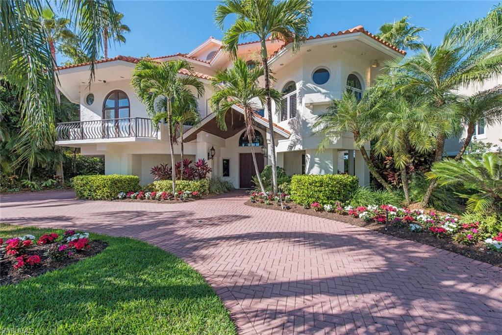 H.11242 - Seldom ever does a property of this magnitude come to market. Built like a fortress in 1994, this beachfront estate offers  the most magnificent, high quality architectural appointments imaginable. Throughout the 5888 square feet of A/C living space, the interior and exterior quality and elegance prevail. Boasting three large superb bedroom suites with custom closets, three and one-half baths, living and family rooms, built-ins, elevator, fireplace, impact glass, and much more. "A MUST SEE." The master suite with sitting room, stepping out to an open terrace balcony bringing the Gulf of Mexico’s gorgeous nightly sunsets indoors. A heated, oversized pool and spa with a private gate offering few steps to the gorgeous stretch of sugar white sandy shore of prestigious Hideaway Beach. Enjoy the beauty of living at a 24-hour gated community that offers extensive world class lifestyle amenities such as golf, exercise facility, beach clubhouse and pool, tennis courts, pickle ball, croquet, and three restaurants. Naturalistic landscaping with a family room that melds an awe-inspiring view of the Gulf of Mexico coastline.  Lifestyle, Luxury, and Location all in one place.