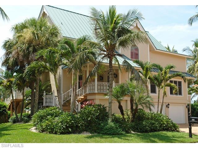 Three bedroom plus den, three bath home located in spectacular Barefoot Beach!  Walk only steps to Barefoot Beach and the pool. Gulf of Mexico views from nearly every room! Furniture and furnishings negotiable.