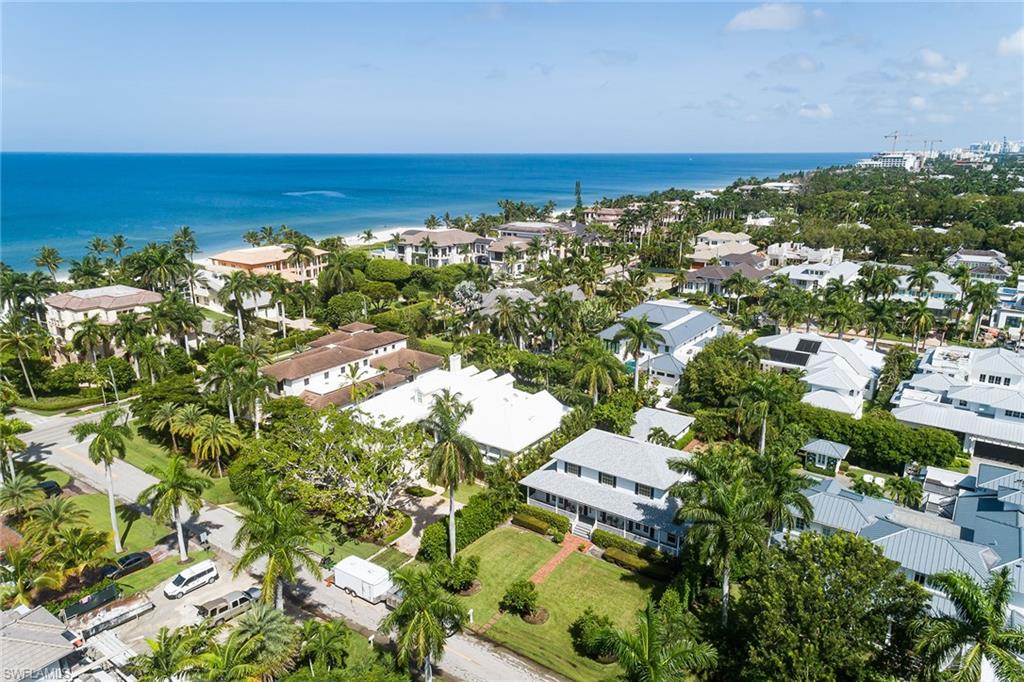An exciting building opportunity nestled between Gulf Shore Boulevard and 2nd Street South!  Situated on one of the most desirable and quiet streets in Olde Naples, with close proximity to beach access and an easy walk to 5th Avenue South. The existing home is very liveable, with no flooding occurring in the main structure.  The property has been handed down from generation to generation, and this is the first time it is being offered for sale. The home is being sold as-is.