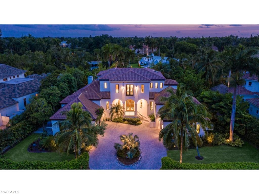 Picturesque setting along the shores of Lantern Lake. A tranquil ambiance prevails throughout, with primary emphasis on a flowing contemporary floor plan. Extensive renovations performed by BCB Homes in 2019! The kitchen and great room with its soaring ceiling open seamlessly to a large veranda and pool deck beyond. The very private first floor master suite also focuses on lake views with Port Royal’s iconic bridge as the focal point in the distance. A second bedroom suite with ensuite bath and a formal office provide additional first floor accommodations. Two other bedrooms and a media room are located upstairs offering other members of the household or guests their very own special havens. The extensive outdoor living spaces include a summer kitchen with built-in grill, expansive covered living and dining areas, and access to a lower pool deck and intimate fire pit area. Three garage bays. The home is just minutes from the Port Royal Club with its celebrated beachfront dining and well-equipped and superbly managed spa facilities. Port Royal Club membership eligibility.