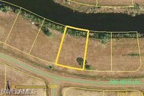 CANAL LOT on Cape Coral!! Completely clean ready for Build your Dream home.