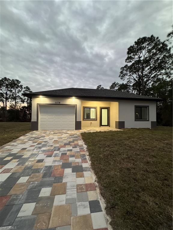 Like-new home offering modern design, quality craftsmanship, and move-in-ready condition! This beautifully maintained residence features 3 bedrooms, 2 bathrooms, an open-concept floor plan, tile flooring throughout, impact-resistant windows, quartz countertops, custom wood cabinetry, stainless steel appliances, and a spacious kitchen with pantry. Enjoy a bright and inviting living area, a comfortable primary suite, and a one-car garage. The home is equipped with a 3-ton air conditioning system installed in 2025, providing comfort and energy efficiency. Conveniently located with easy access to schools, shopping, dining, and major roadways. Whether you're looking for your next home or an investment opportunity, this property is a must-see! Seller concessions toward buyer's closing costs may be available with an acceptable offer.