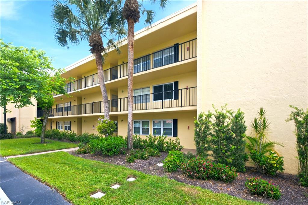 Turnkey furnished beautiful end unit 2-bedroom, 2-bath condo. Located on the southern end on the 2nd floor with elevator. This is a bright and airy unit with updated kitchen and baths. Newly painted with newer high-impact windows and sliders. Plenty of closets and a full-size washer and dryer in unit. Beautiful views of the second green and third hole tees from the screened lania and dining area windows. Forest Lakes is a 55+ community with 3 community pools, tennis courts, bocce court, clubhouse and lovely landscaping.  This is a pet-free, smoke-free unit. Located less than 2 miles from the pristine Clam Pass beach, The Naples Grande resort and The Waterside Shoppes. One mile via back road to Publix, Target, Bealls, hair salon, dentist, banks and restaurants.