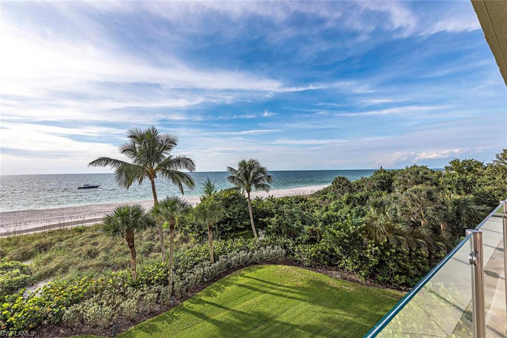 C.16754 - ON THE SAND! SEAPOINT AT NAPLES CAY #1N is THREE FLOORS UP and JUST STEPS TO THE BEACH! This 4,950 SF under air, 4 BR/4 BA condo lives like a private, luxury beachfront home. Only 28 units, 2 per floor, Seapoint at Naples Cay is one of Naples’ most prestigious and exclusive condo residences with water views from every room.  PRIVATE 2 CAR GARAGE with private stairway directly to the lanai.  Large Wolf GAS GRILL ON THE LANAI, which is very rare for a high rise condo.  New Karastan carpet recently installed. PET FRIENDLY! This elegant and relaxed building offers a state of the art fitness room surrounded by water views, infinity edge pool, 24 hour manned desk, two luxuriously appointed guest suites and an intimate social room overlooking the beach. Naples Cay is nestled between Park Shore & Pelican Bay, a hidden gem of a community offering a unique level of privacy and tranquility, yet is within walking distance to fine dining, shopping & entertainment to Venetian Village, Waterside Shops, and Artis-Naples. Centrally located in Naples. Short drive to Mercato and 5th Ave.