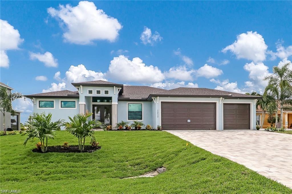 Several Offers final and  best by 5 pm on July 20, 2020.  Move in Ready Home, Great neighborhood pool home facing south, 3 bedrooms + den, 2 baths, and a 3 car garage. Impact glass doors and windows, Tile throughout including the living room, den, all the bedrooms. The home has tray ceilings, solid wood, white 42" cabinets, brushed nickel hardware, stainless steel appliances, and granite counter tops throughout! 8 ft doors! In the master bedroom you will find a trey ceiling w/ trey light, two walk-in closets, dual sinks, and a separate tub and shower. Your salt water pool comes equipped with an extended paver deck, sun shelf with a bubbler, 2 deck jets, and an LED light (changes colors). Plenty of room for kids to play or pets to roam!! There is also an area pre-plumbed/wired for an outdoor kitchen. Epoxied garage floor with flakes! This home has a lot of upgrades. The back yard is fenced in for your family and pets enjoy.   City water and sewer are in.