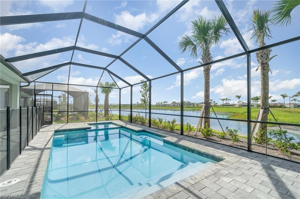 Discover Your Dream Oasis! Welcome to one of Tuckers Cove’s most desirable residences: the highly sought-after ARECA model with ADDITIONAL DEN, perfectly positioned on a premium, quiet lakefront homesite while you enjoy one of the closest and most convenient locations in the only waterpark inspired community with the thrilling lazy river, splash park, iconic Pirate Ship Restaurant, and Luau Beach! 

With over $25,000 in thoughtful upgrades, this home blends luxury, comfort, and true Florida resort-style living:

•  A private HEATED POOL & SPA on your extended lanai, creating the ultimate backyard retreat overlooking tranquil lake waters.

•  That EXTRA DEN gives you incredible versatility—for a home office, hobby room, or guest retreat—while overlooking serene lake views in peaceful privacy.

•  Beautiful wood-look tile flooring throughout the entire home (NO CARPET ANYWHERE) for a clean, coastal elegance that’s both stunning and practical.
•  Open-concept living flooded with natural light and seamless indoor-outdoor flow through THREE PANEL LARGE SLIDING DOOR overlooking the pool. 

•  Chef-inspired kitchen featuring quartz countertops, a large center island, gas cooking, and expansive cabinetry—ideal for your dream coffee bar or effortless gatherings.

•  Spacious primary suite with generous closets and a luxurious en-suite bathroom that feels like a daily spa escape.

•  Private guest bedroom with its own full bath.

•  Hurricane impact glass throughout and an upgraded LAUNDRY ROOM WITH EXTRA CABINETRY & SINK for maximum convenience.

This home checks every box—style, upgrades, location, and lifestyle. Enjoy living in America’s first entirely solar-powered town, recently rated 4th among master-planned communities, with beautiful parks, 100 miles of nature trails, concerts, a gym, spa, grocery stores, healthcare, shopping, and thoughtfully planned activities every month.

If you’ve been dreaming of the perfect blend of luxury, space, and an incredible resort lifestyle, this is it!