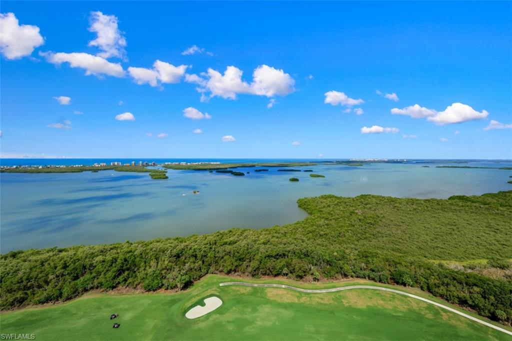 Experience luxury living at its finest in this custom penthouse in Seaglass at Bonita Bay! This 4+den/4.5 bath/2.5 car PRIVATE garage, furnished condo offers breathtaking views of the Gulf of Mexico and Estero Bay. With floor-to-ceiling glass windows, a cozy fireplace, two open-air balconies, you'll be immersed in the beauty of the lush surroundings. Inside, you'll find high-end features like light wood flooring, a 48" Sub-Zero refrigerator, Bosch oven, Thermidor gas stove, two wine coolers, Lutron shading system, audio/visual/wireless network, and wet bar. Seaglass takes care of your lifestyle with concierge services, a theater room, private guest suites, and a stunning pool & spa. Bonita Bay offers a staff-attended private beach club on Bonita Beach just a 10-minute drive away, an on-site marina with restaurant, boat storage, and ramp. Enjoy biking and hiking, kayak rentals and storage, and three beautiful parks. If you join The Club at Bonita Bay, you'll gain access to 5 golf courses designed by Arthur Hill & Tom Fazio, 18 tennis courts, pickle ball, a croquet lawn, and a zero-entry pool with poolside dining, 5 restaurants & access to the amazing Lifestyle Center fitness center.