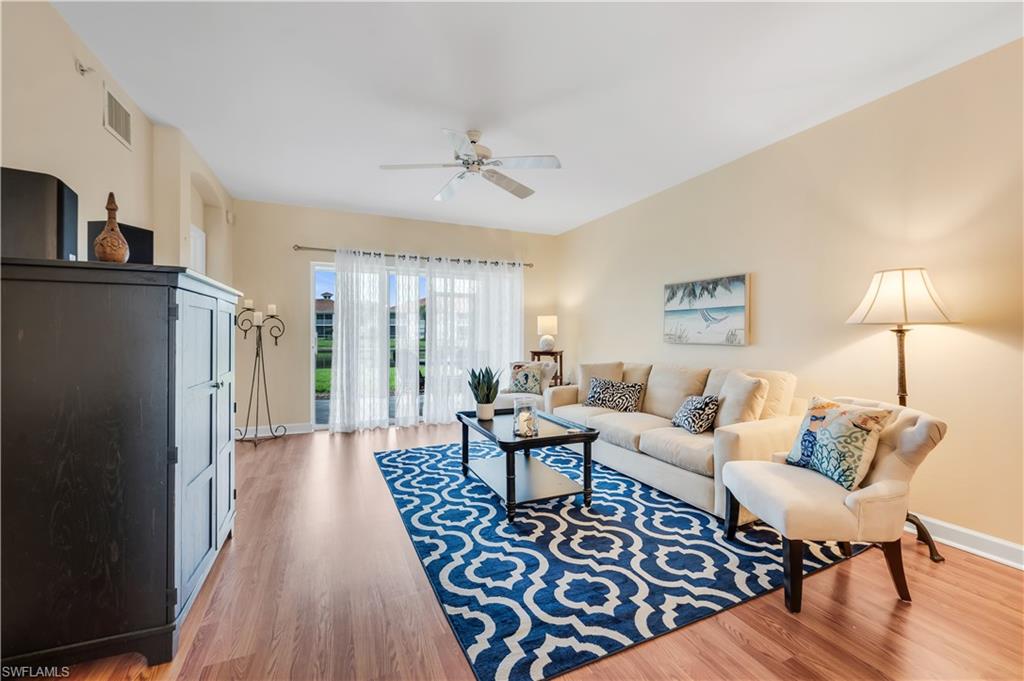 Rarely does a first-floor residence offer this exceptional combination of convenience, location, and lifestyle. Welcome to this beautifully maintained 2-bedroom, 2-bath condominium with GARAGE in the highly sought-after gated community of Bridgewater Bay. Offering a light and bright open floor plan with a detached one-car garage AND an assigned parking space, this residence features the convenience of no stairs and is ideally located in the preferred X Flood Zone, where flood insurance is generally not required by lenders.  A newer roof, just three years young, provides added peace of mind.  The desirable split-bedroom floor plan includes a spacious kitchen with a raised breakfast bar and a charming eat-in breakfast nook, creating the perfect space for casual dining and entertaining.  Luxury vinyl plank and tile flooring extend throughout the home—there's no carpet to maintain—while plantation shutters add timeless style and elegance.  Relax on the screened lanai while enjoying peaceful lake and fountain views, complete with convenient roll-down storm shutters for added protection and peace of mind.  The detached garage provides secure parking along with valuable additional storage for bikes, beach gear, golf clubs, and seasonal items.

Bridgewater Bay is one of North Naples' most desirable gated communities, offering an exceptional resort-style lifestyle. Residents enjoy a beautiful clubhouse with a newly renovated social room, billiards, sauna and steam rooms, a fitness center, resort-style pool and spa, screened lap pool, tennis, pickleball, bocce, basketball, fishing pier, children's play area, and a full calendar of social activities.  Ideally located just minutes from Naples' world-famous beaches, Mercato, Waterside Shops, fine dining, shopping, golf, and top-rated schools, this home offers the perfect combination of comfort, convenience, and the Southwest Florida lifestyle buyers dream about.
