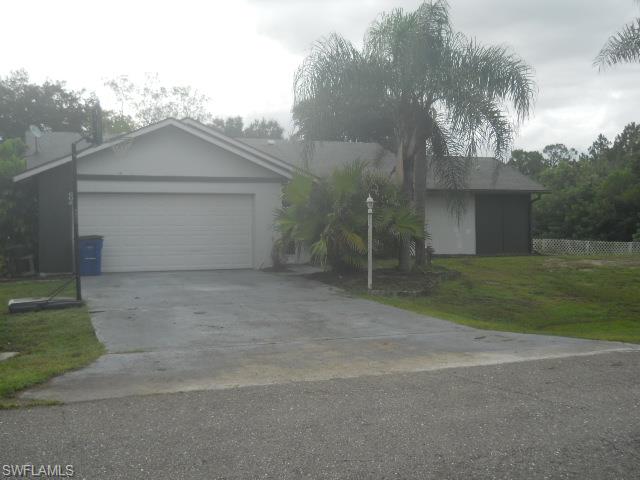 This home is in a great location and is in great shape. There are three bedrooms, two baths and then a HUGE great room/den area in the back that is under air. The septic and drain field were replaced in the last two years and a new well was just dug in the last year. The front entry is screened, the kitchen has tile counter tops and breakfast bar and the oak trees and palms in the yard provide shade and quiet. The pool is in good condition and be quite inviting. Stove, one fan and carpet in garage do not convey.