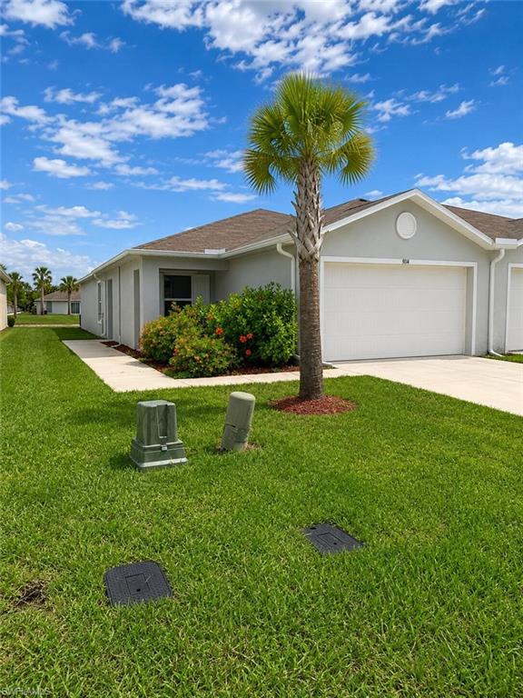 Beautiful 2022-built lakeview villa located in the gated and well maintained community of Vistanna Villas. This 3-bedroom, 2-bath home features an open-concept floor plan, washer and dryer inside laundry closet and attached 2-car garage. 
Total area 1808 sf, living area 1468 sf. 30-day minimum rental period. Located in NON-Flood Zone X. NO CDD fees.
The kitchen comes with stainless steel appliances, a large center island, and plenty of cabinet space. The primary suite includes a private bath and walk-in closet. Enjoy peaceful lake views and low-maintenance living with lawn maintenance included by the HOA.
Community amenities include a pool and playground. Conveniently located near shopping, dining, medical facilities and Downtown Lehigh Acres. JUST 2 miles away from beautiful Veterans Park. Great option for a primary residence, seasonal home or investment property.
All information is deemed reliable but must be verified by buyer and buyer's agent.