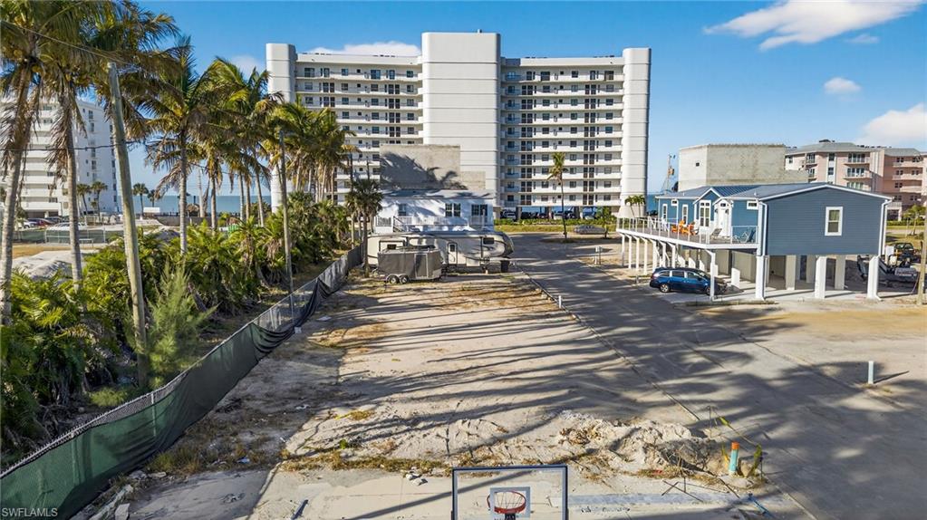 Once a charming mobile home village, this rapidly transforming neighborhood has emerged as a coastal enclave now defined by elevated concrete block and luxury modular homes with timeless coastal appeal. These adjacent properties are being offered together, presenting a rare opportunity to design and build your Southwest Florida dream home just steps from the bay and the soft white sands and unforgettable sunsets of Bonita Beach.
Boaters will appreciate the newly completed seawall, and boat docks, offering direct Gulf access via Hogue Channel and Estero Bay to Wiggins or New Pass. Prefer calm waters? Cruise the scenic backwaters to Naples or Fort Myers without ever entering the open Gulf—a highly coveted advantage for boaters.
This is a rare chance to secure a premium homesite in a neighborhood on the rise, where boating, beach access, and coastal elegance come together to define the ultimate Florida lifestyle.