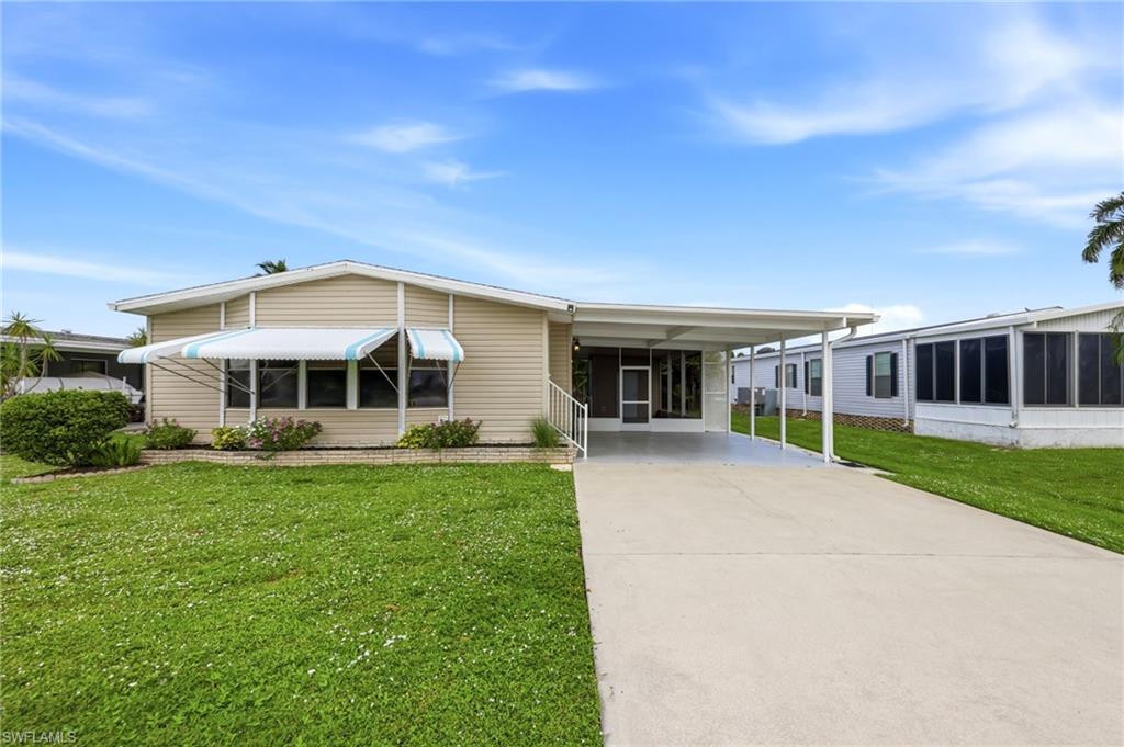 This 2-bedroom, 2-bath home in Riverwood, a desirable 55+ community, sits on land you actually own, with one of the lowest carrying costs you'll find in Naples at just $259 a year. The open layout works whether you're hosting a dinner or just letting the weekend slow down, and the updated kitchen with granite countertops and stainless steel appliances makes it easy to do both. The screened lanai is where your mornings will go. Both bedrooms have walk-in closets, and the storage and workshop out back give everything else a place to land. The big ticket items are already done with a brand new AC, water heater, washer, dryer, and refrigerator, all replaced in 2025 or 2026. This home qualifies for conventional, FHA, and VA financing, which is not something you take for granted in this price range. Riverwood keeps things relaxed with a community pool, boat ramp, fishing pier, and picnic areas, all included in that $225. Less than 20 minutes to the beaches of Naples and Marco Island, and minutes from shopping, dining, and golf.