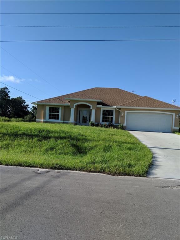 Construction work is 100% completed. This new home are 3/2 with den. Tile floor is throughout the house and Kitchen has wood cabinets and granite counter top.