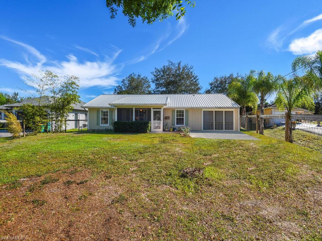 Are you a horse owner or looking to be? Take a look at this amazing opportunity! Enter the fully fenced yard through automatic gates to a 3 bedroom 2 bathroom home with one car garage. The metal roof is 3 years old, water system is one year old. Follow the driveway to the back of the home and be wowed, the entire back of this property has been lovingly planned for your equine friends.  The 75 x 200 purpose built arena has a sand and Reiten Right rubber surface. Beyond the arena there is a permitted 24' x 24' run in shed, three box compost system and space for a round pen.  The property is completely fenced with 5' no climb horse fence.  A 50 amp electric, water and cable hook up for RV make it ideal for guests on the road. This is your chance to enjoy your own piece of paradise on 1.17 acres.